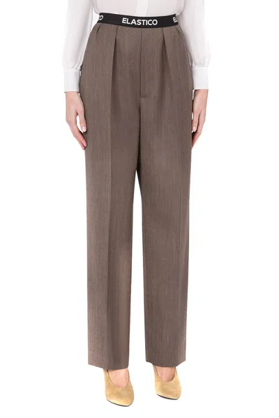 Shop Moschino Trousers In Brown