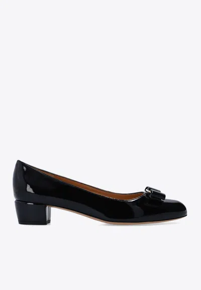 Ferragamo Vara Bow-embellished Patent-leather Pumps In Black