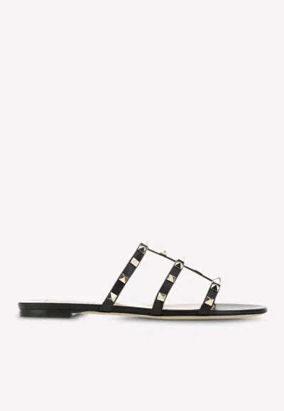 Valentino Rockstud Slide Sandal In Laminated Nappa With Cabochon In Black