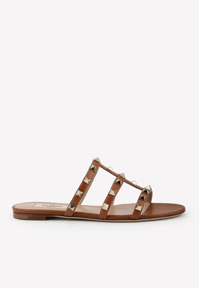 Valentino Garavani Rockstud Flat Metallic Nappa Slide Sandal Woman Bronze 41 In Brown
