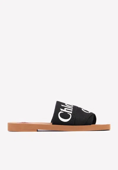 Shop Chloé Woody Logo Flat Mules In Black