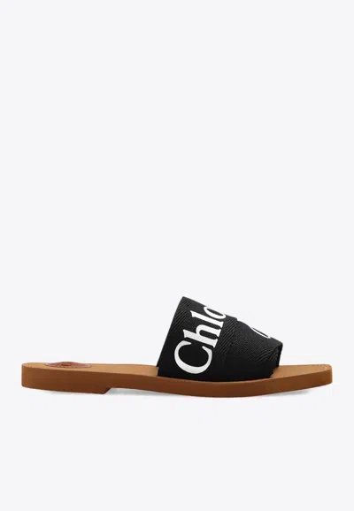 Chloé Woody Flat Logo Ribbon Slide Sandals In Black