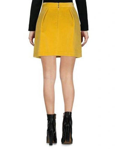 Shop Msgm Mini Skirt In Ocher