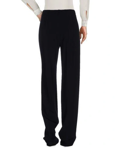 Shop Emilio Pucci Casual Pants In Black