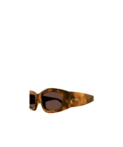 Alaïa Rectangular Sunglasses In Brown