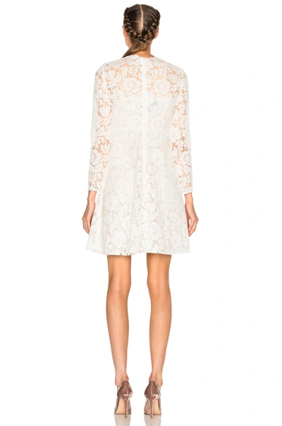 Shop Valentino Long Sleeve Lace Dress In White. In Avorio