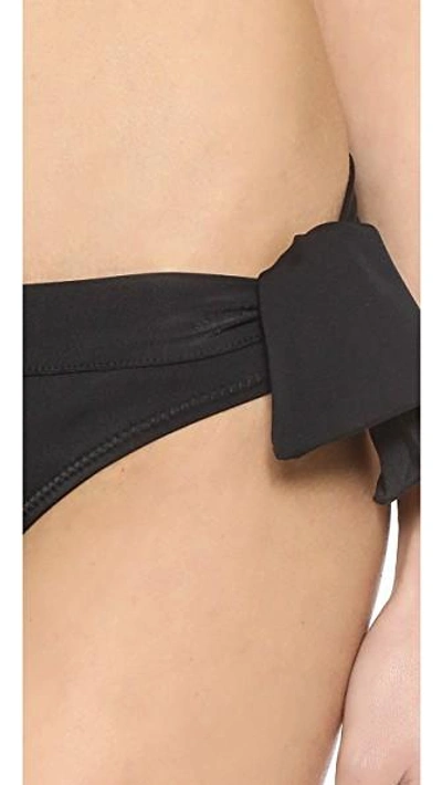 Shop Norma Kamali Eric Tie Side Bikini Bottoms In Black