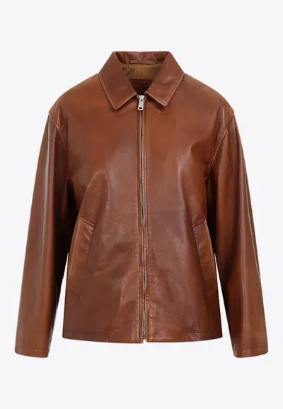 Prada Enamel-logo Leather Jacket In Brown