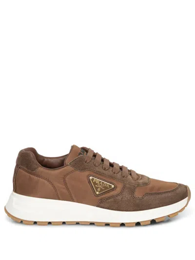 Shop Prada Sneakers In Brown