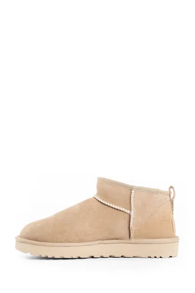 Ugg 10mm Classic Ultra Mini Shearling Boots In Beige