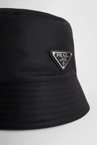 Prada Logo-embellished Shell Bucket Hat In Black