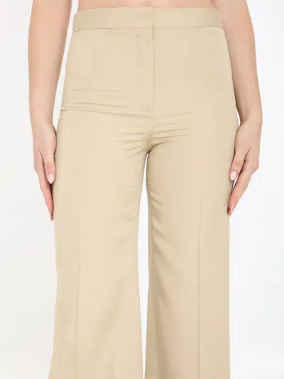 Stella Mccartney Iconic Beige Flare Pants For Women In Sand-colored Viscose