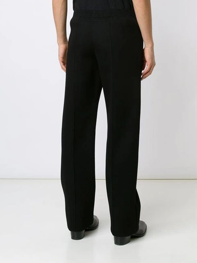 Shop Givenchy Wide Leg Trousers In Black