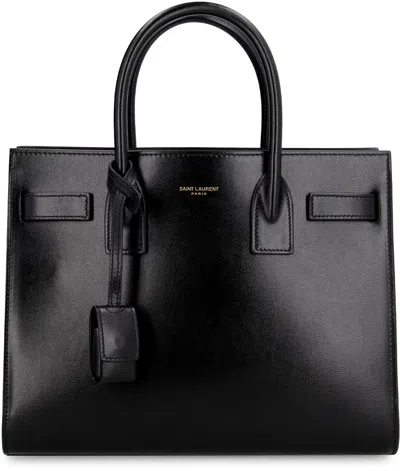 Saint Laurent Smooth Black Leather Mini Tote Handbag With Removable Shoulder Strap And Metal Hardware