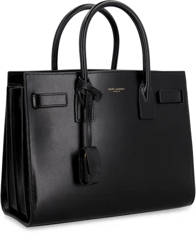 Saint Laurent Smooth Black Leather Mini Tote Handbag With Removable Shoulder Strap And Metal Hardware