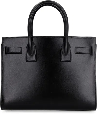 Saint Laurent Smooth Black Leather Mini Tote Handbag With Removable Shoulder Strap And Metal Hardware