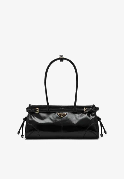 Shop Prada Medium Leather Top Handle Bag In Black