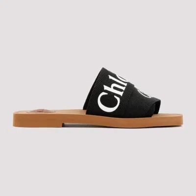 Chloé Woody Flat Logo Ribbon Slide Sandals In Black