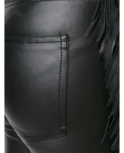 Shop Saint Laurent Fringed Leather Trousers