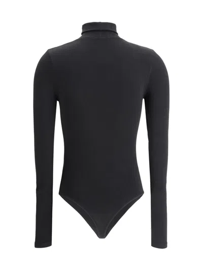 Wolford Seamless Fitted Turtleneck Long-sleeved Top In Black