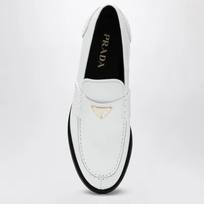 Prada Triangle Logo Brushed Leather Loafers In White