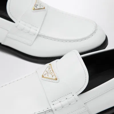 Prada Triangle Logo Brushed Leather Loafers In White