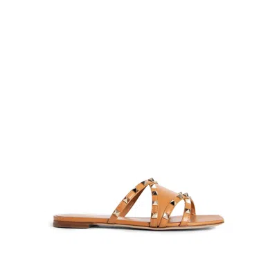 Valentino Garavani Rockstud Leather Flat Sandals In Brown