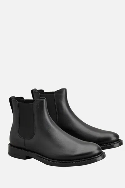 Shop Tod's Boots In Black