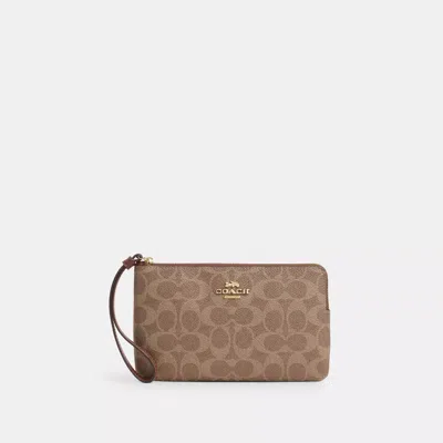 Coach Outlet Large Corner Zip Wristlet In Signature Canvas In Beige