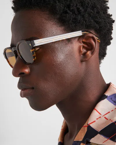 Prada Logo-engraved Sunglasses In Green