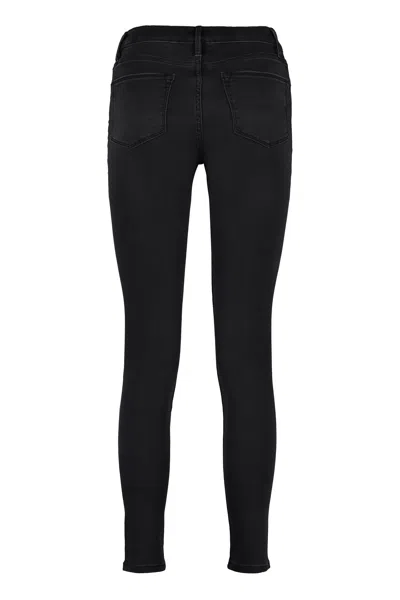 Shop Frame High-rise Skinny Jeans