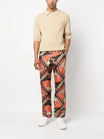 Valentino Stylish Ss23 Pants In St. Archive Manifesto Bandana Arancio For Men