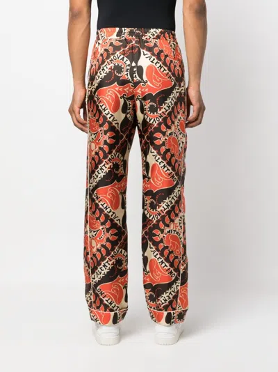 Valentino Stylish Ss23 Pants In St. Archive Manifesto Bandana Arancio For Men