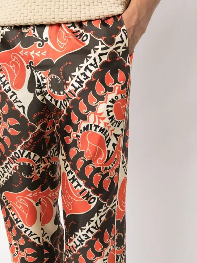 Valentino Stylish Ss23 Pants In St. Archive Manifesto Bandana Arancio For Men