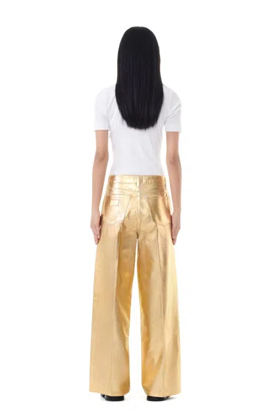 Ganni Gold Five Pockets Wide Jeans In Laminated Fabric Woman