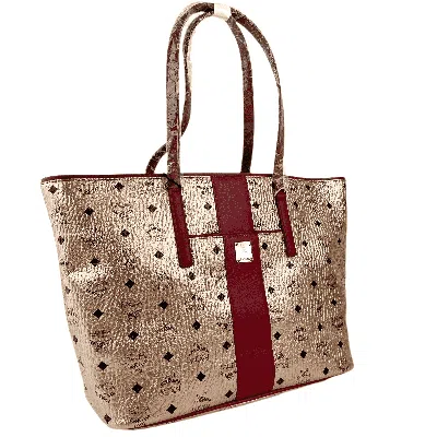 Mcm Champagne Gold Monogram Visetos Canvas Medium Tote Bag In Gold