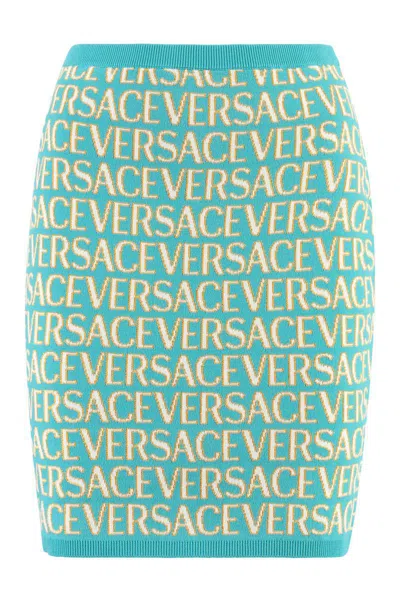 Versace Allover Logo-jacquard Miniskirt In Turquoise