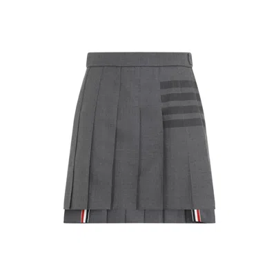Thom Browne Thigh Length Dropped Back Pleated Skirt In Grey