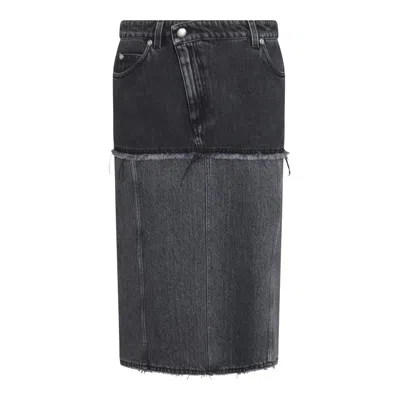 Alexander Mcqueen Mcqueen Two-tone Low Rise Denim Midi Skirt In Black Stonewashed