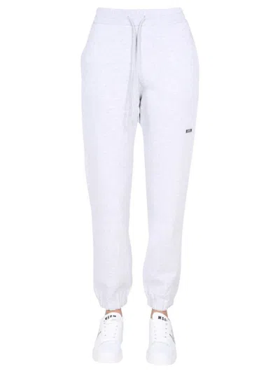 Msgm Jogging Pants With Logo Print In Grey