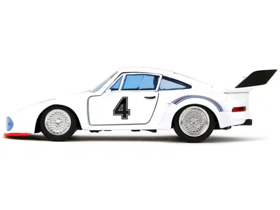 Diecast Model Jada Porsche 935 Turbo #4 "jazz" White With Blue And Red Stripes "transformers" "hollywood Rides" Series