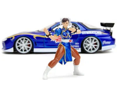 DIECAST MODEL JADA 1993 MAZDA RX-7 CANDY BLUE METALLIC WITH GRAPHICS AND CHUN-LI DIECAST FIGURE "STREET FIGHTER" VIDEO  