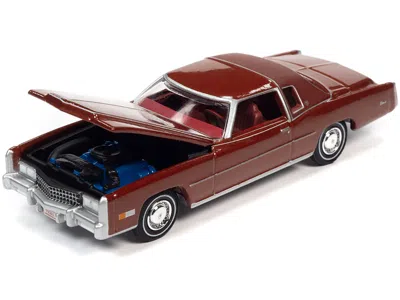 DIECAST MODEL AUTOWORLD 1975 CADILLAC ELDORADO FIRETHORN RED METALLIC WITH REAR SECTION OF ROOF MATT DARK RED "LUXURY CRUISE 