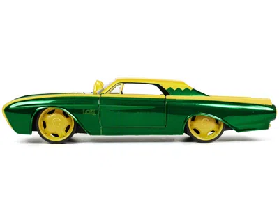 Diecast Model Jada 1963 Ford Thunderbird Green And Yellow Metallic With Hood Graphics And Loki Diecast Figure "loki" "m