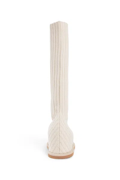Amina Muaddi Ribbed Texture Flat Sole Sock-like Boots In Beige