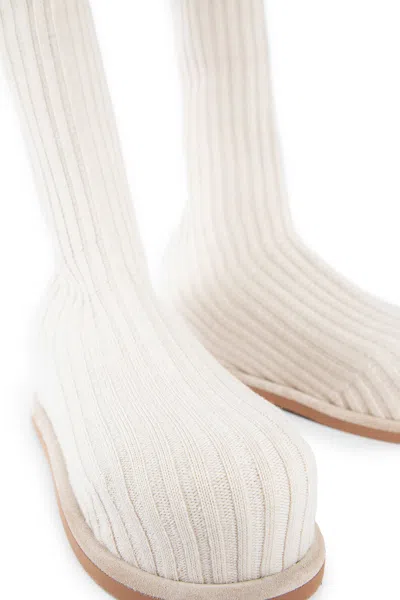Amina Muaddi Ribbed Texture Flat Sole Sock-like Boots In Beige