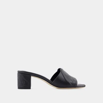 Alexander Mcqueen Black Slip-on Sandals With Embossed Logo In Padded Leather Woman In Black