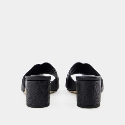 Alexander Mcqueen Black Slip-on Sandals With Embossed Logo In Padded Leather Woman In Black