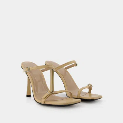 Shop By Far Flick Mule In Nude