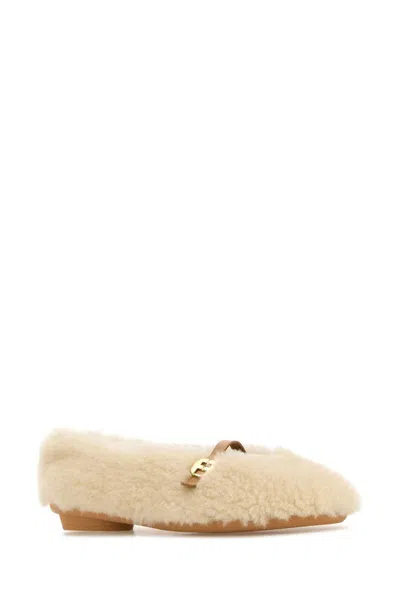 Ferragamo Shearling Hardware Round Toe Ballerinas In White